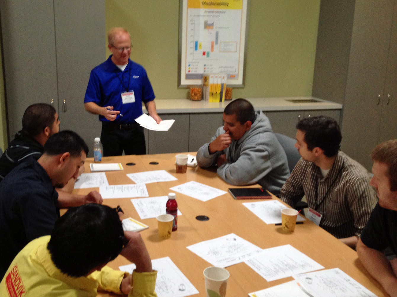 Program Committee Chair Robin Rutschilling leads a job planning discussion to help understand the decisions needed to determine best way to make a part. 